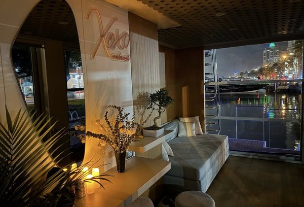 The enclosed lounge with ambient lighting