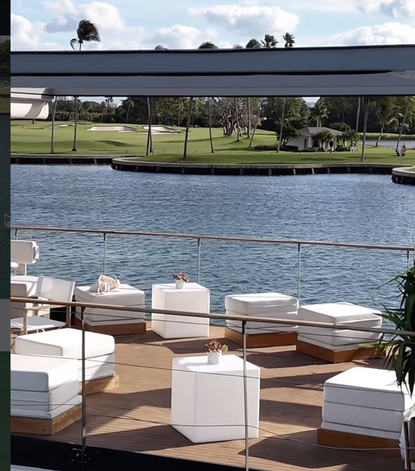 Rooftop lounge seating on the water